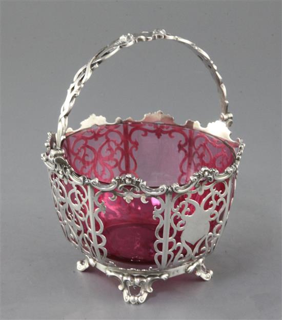 A Victorian pierced silver sugar basket by James & Nathaniel Creswick, 10cm.